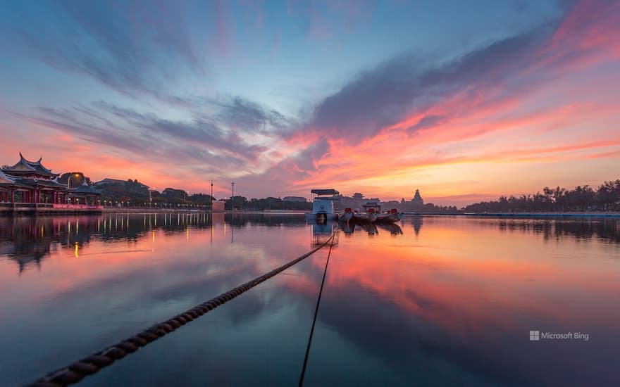 Sunrise over Dragon Boat Pond, Jimei District, Xiamen, China