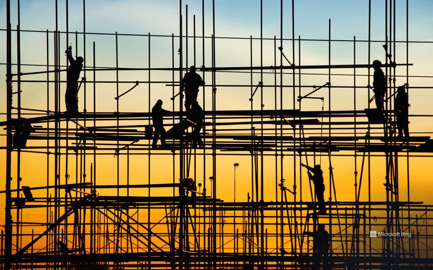 Construction workers on scaffolding