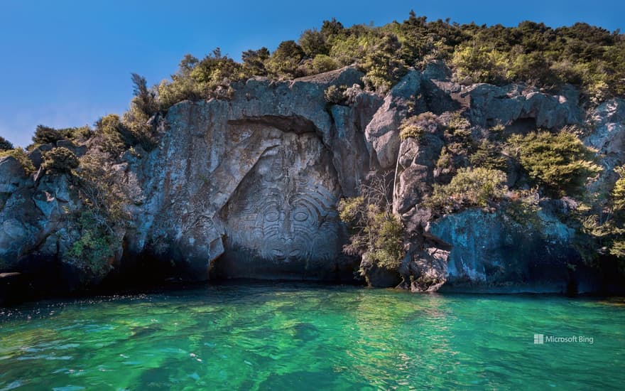 The Mine Bay Māori Rock Carving of Ngatoroirangi by Matahi Whakataka-Brightwell on Lake Taupo, North Island, New Zealand