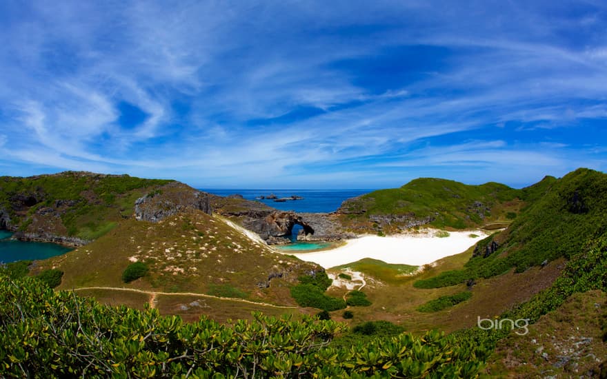 Sea cave and coral sand beach of South Iwo Jima Island (Minami-Iōtō), Japan